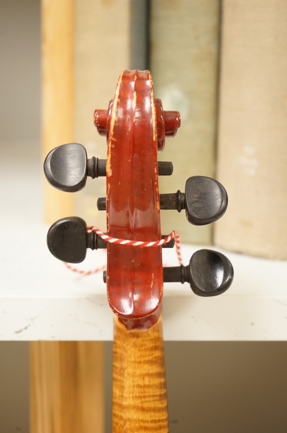 Three musical instruments to include a Buffet flute and violin with two bows